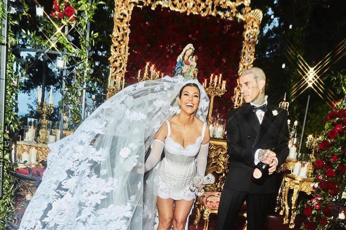 Kourtney and Travis wore Dolce & Gabbana for their wedding [Instagram/KourtneyKadash]