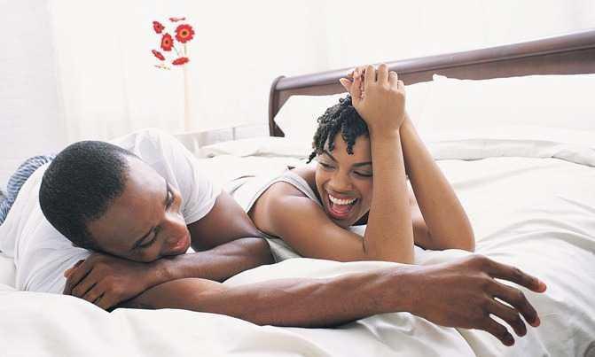African couple in bed (Opinionated Male)