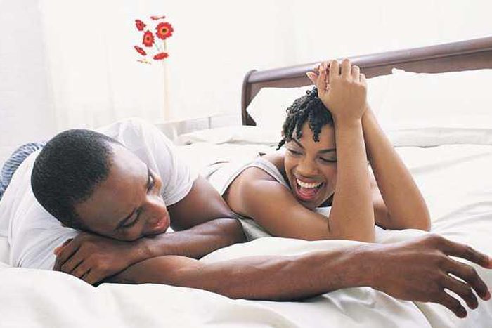 African couple in bed (Opinionated Male)
