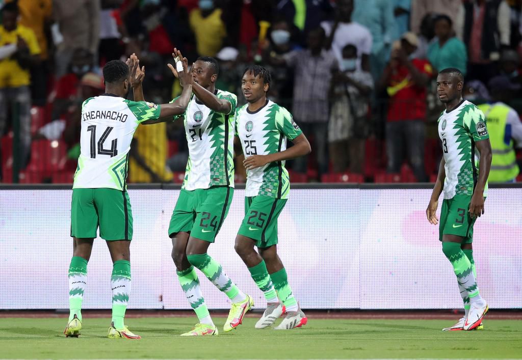 Sadiq Umar celebrates with Super Eagles teammates after scoring Nigeria's opener against Guinea-Bissau