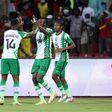 Sadiq Umar celebrates with Super Eagles teammates after scoring Nigeria's opener against Guinea-Bissau