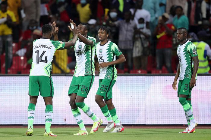 Sadiq Umar celebrates with Super Eagles teammates after scoring Nigeria's opener against Guinea-Bissau