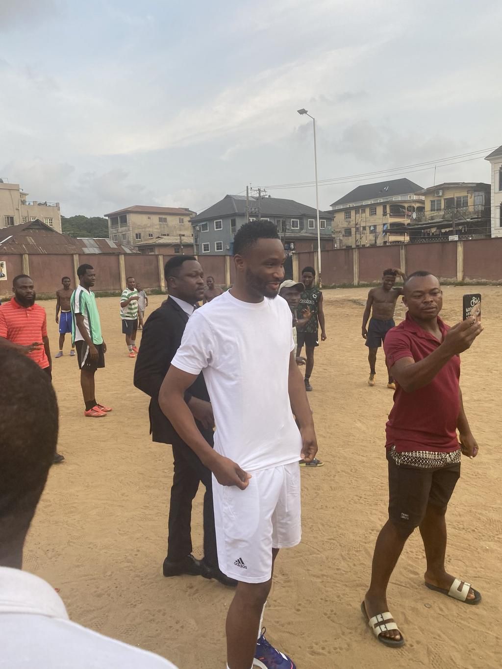 Mikel Obi plays with kids at Ebute Metta