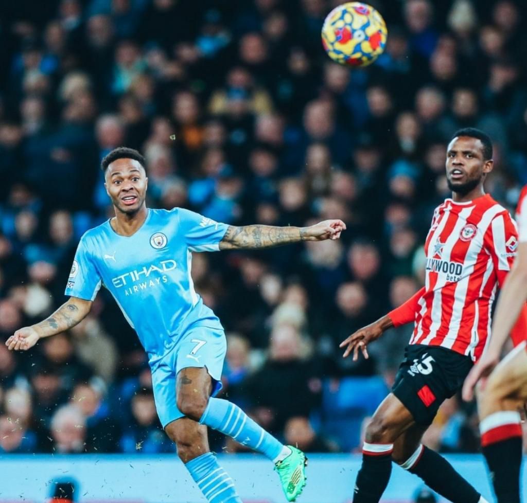 Frank Onyeka watches an Raheem Sterling attempt.