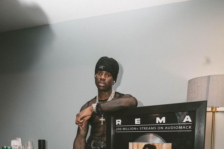 Rema presented with plaque for exceeding 200 million streams on Audiomark