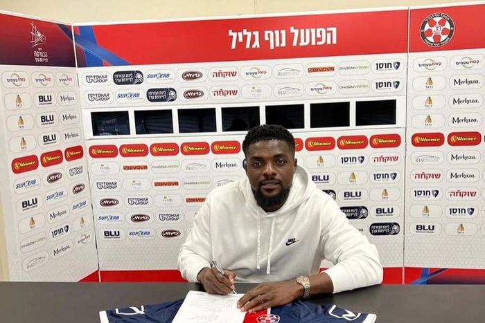 John Ogu puts pen to paper.