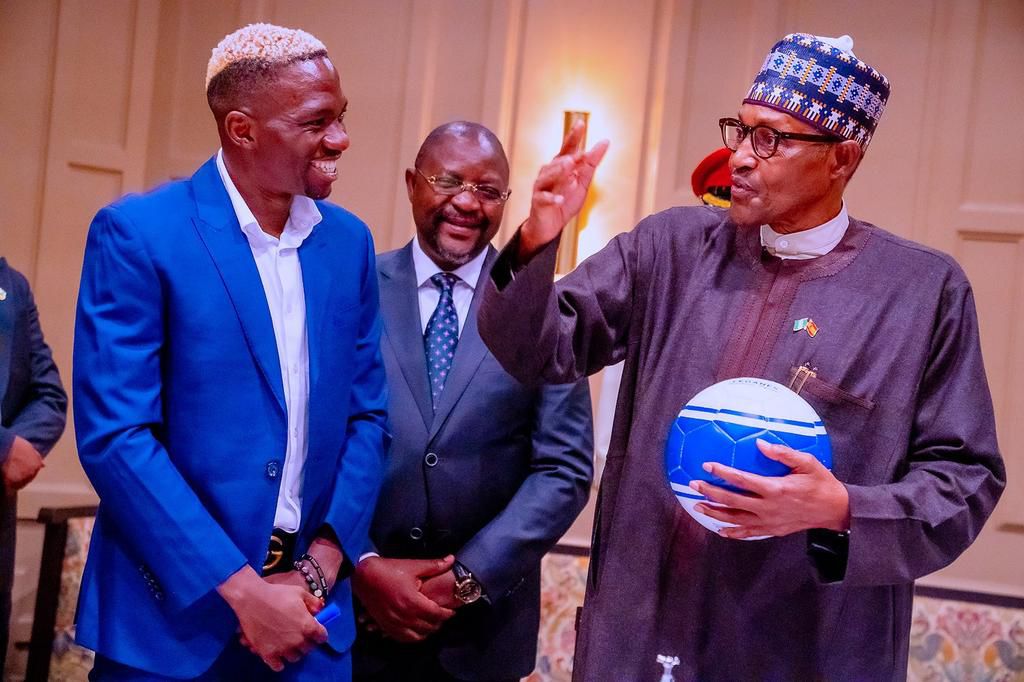 President Buhari meets Omeruo In Spain