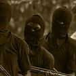 Unknown gunmen in face mask - Illustration purpose
