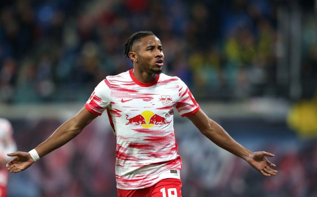 Christopher Nkunku celebrates after giving RB Leipzig the lead against Borussia Dortmund