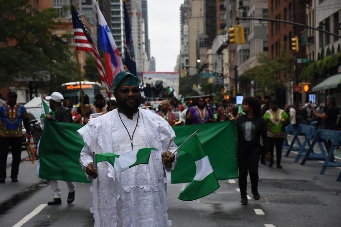 (Front) Mr Solomon Adelaja, Public Relations Officer, Organisation for the Advancement of Nigerians (OAN) leading the 2022 edition of Independence Day Parade on Saturday in New York.