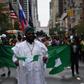(Front) Mr Solomon Adelaja, Public Relations Officer, Organisation for the Advancement of Nigerians (OAN) leading the 2022 edition of Independence Day Parade on Saturday in New York.