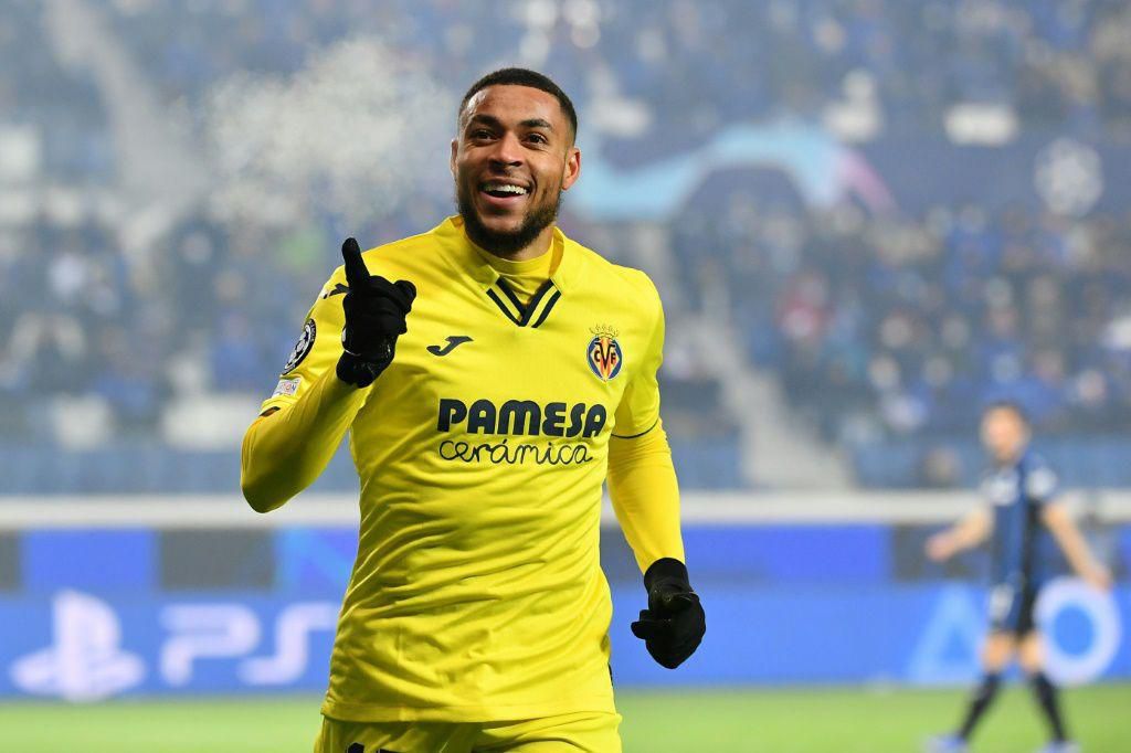 Arnaut Danjuma scored twice as Villarreal qualified for the Champions League last 16