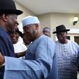 Former President Goodluck Jonathan and former Vice-President Atiku Abubakar in warm embrace.