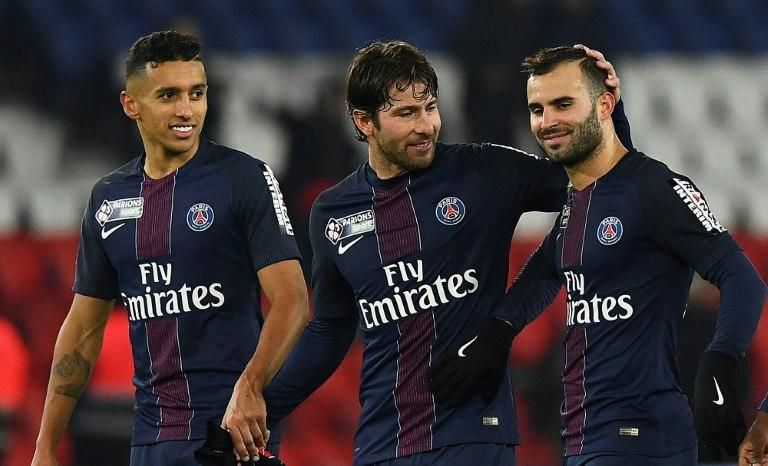 (from L) Paris Saint-Germain's Marquinhos, Maxwell and Rodriguez Jese react after defeating Lille at the Parc des Princes stadium on December 14, 2016