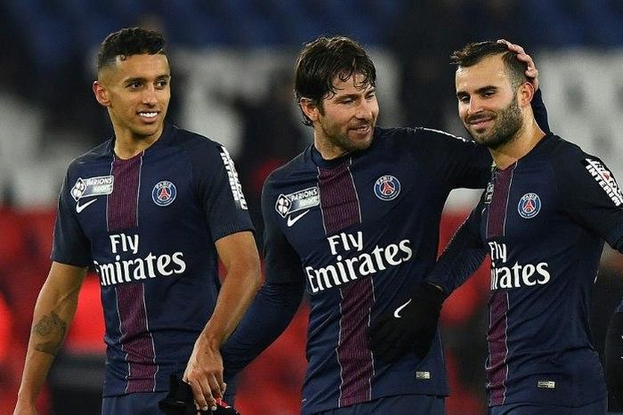 (from L) Paris Saint-Germain's Marquinhos, Maxwell and Rodriguez Jese react after defeating Lille at the Parc des Princes stadium on December 14, 2016