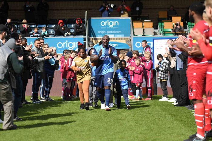 Akinfenwa receiving his guard of honour before kickoff