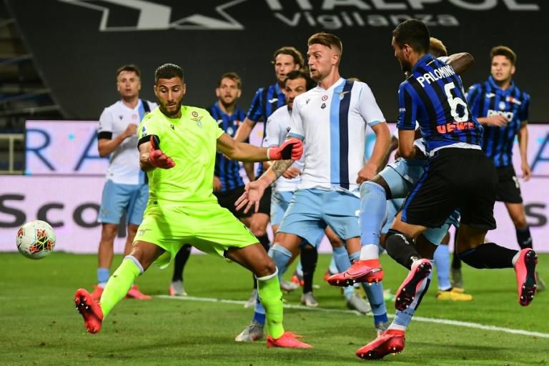 Atalanta defender Jose Luis Palomino (R) scores the winner against Lazio.