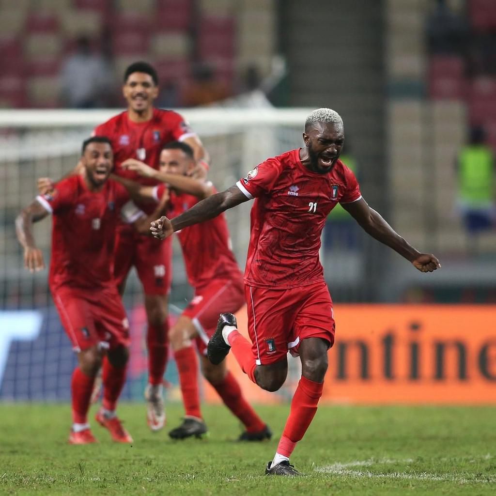 Equatorial Guinea players celebrate against Sierra Leone.