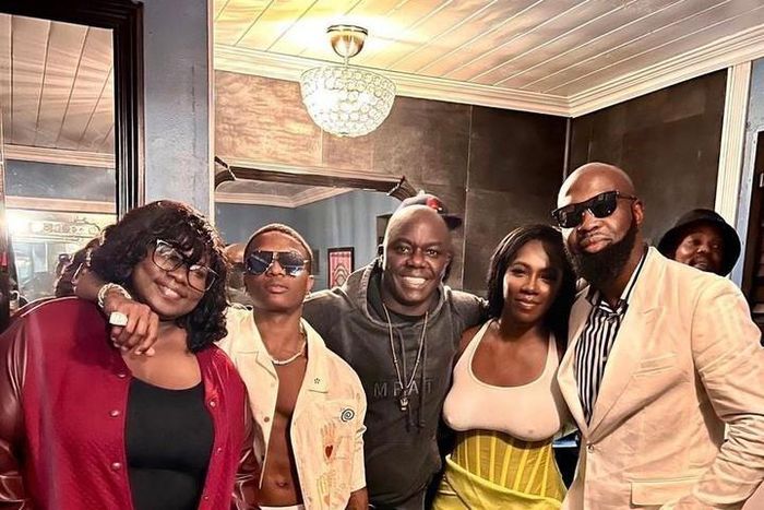 Wizkid flanked by Ayo Animashaun, Tiwa Savage and Audu Makori [Tooxclusive]