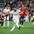 Benzema ushers Barcelona top of La Liga after missed penalty in Real Madrid's 1-1 draw against Osasuna