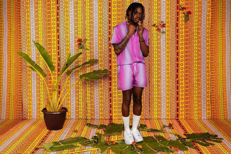 Fireboy in an ombre Boohooman set {instagram/fireboy}