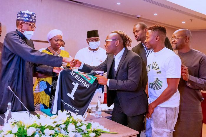 President Muhammadu Buhari gifted jersey in Portugal