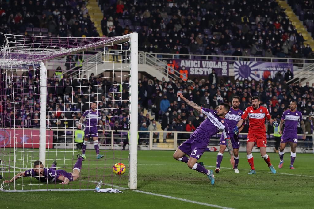 Nikola Milenkovic watches helplessly on as Lorenzo Venuti turns the ball into his own net