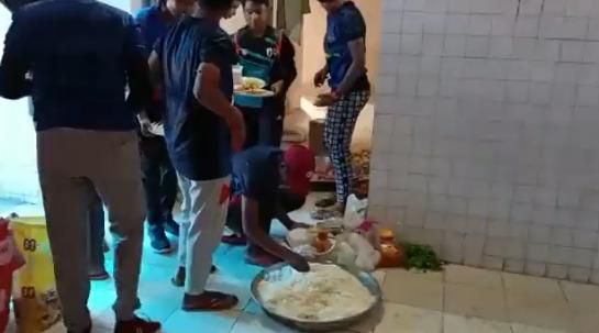 Disturbing video of young Indian students being served food in a toilet (Screenshot)