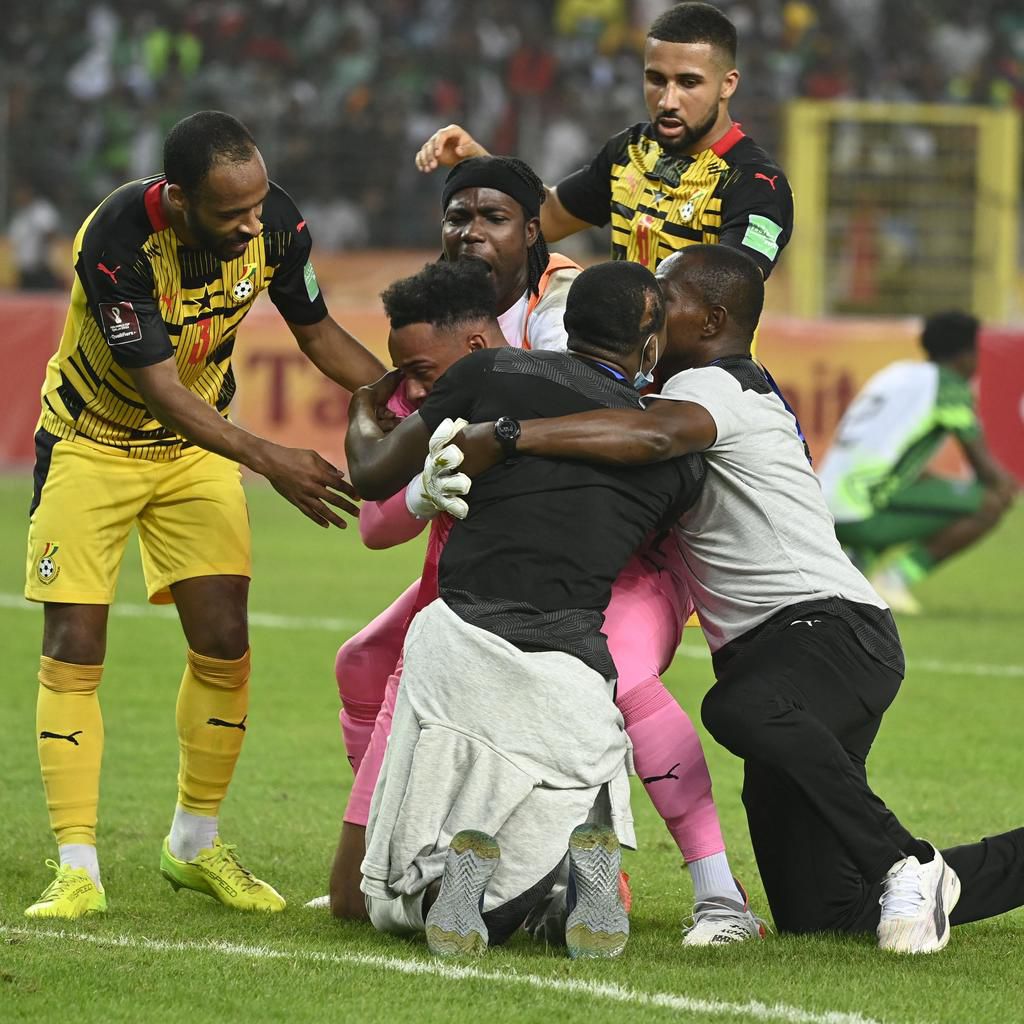 Black Stars players and staff celebrating their Qatar 2022 ticket