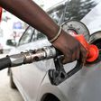 A pump attendant fills the tank of a car at a petrol station in September 4, 2018 in Nairobi as a 16 per cent VAT on petroleum products was decided and fuel distributors refused to collect stocks from depots. (Photo by SIMON MAINA/AFP via Getty Images)