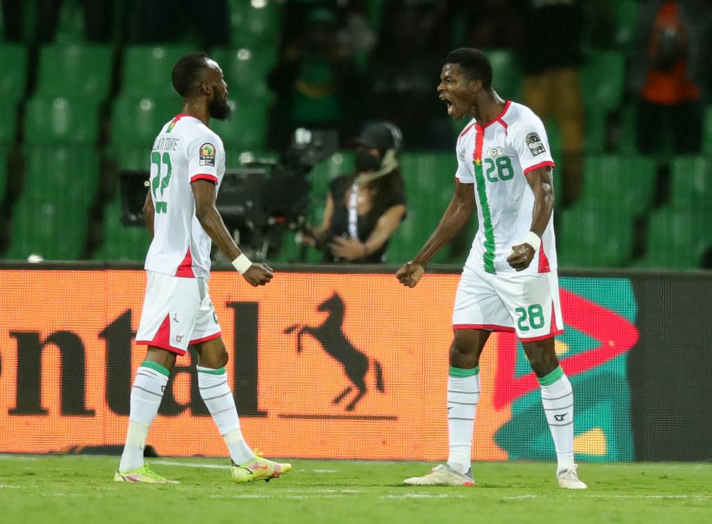 Dango Ouattara celebrates scoring for Burkina Faso with teammate, Ibrahim Toure