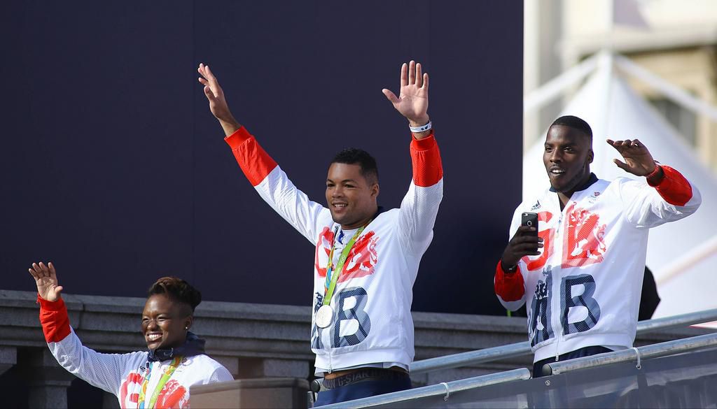 Okolie (R) celebrates with other Team GB medalists after the 2016 Olympic Games