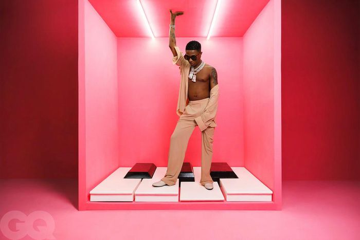 Wizkid in shirts and pants from MM6 Maison Margiela [GQ]