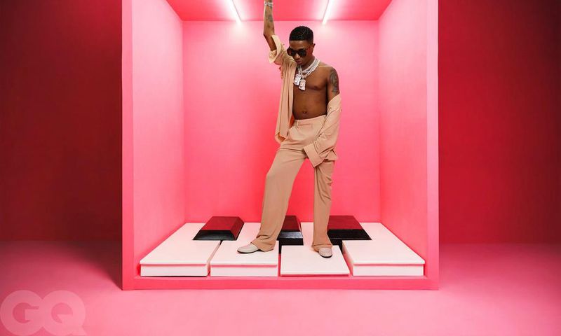 Wizkid in shirts and pants from MM6 Maison Margiela [GQ]