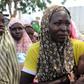 A woman breastfeeds her baby after being rescued from Boko Harm, near Mubi, northeast Nigeria October 29, 2015. REUTERS/Stringer