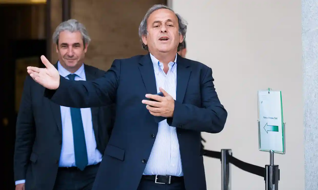 Michel Platini leaves court on Wednesday