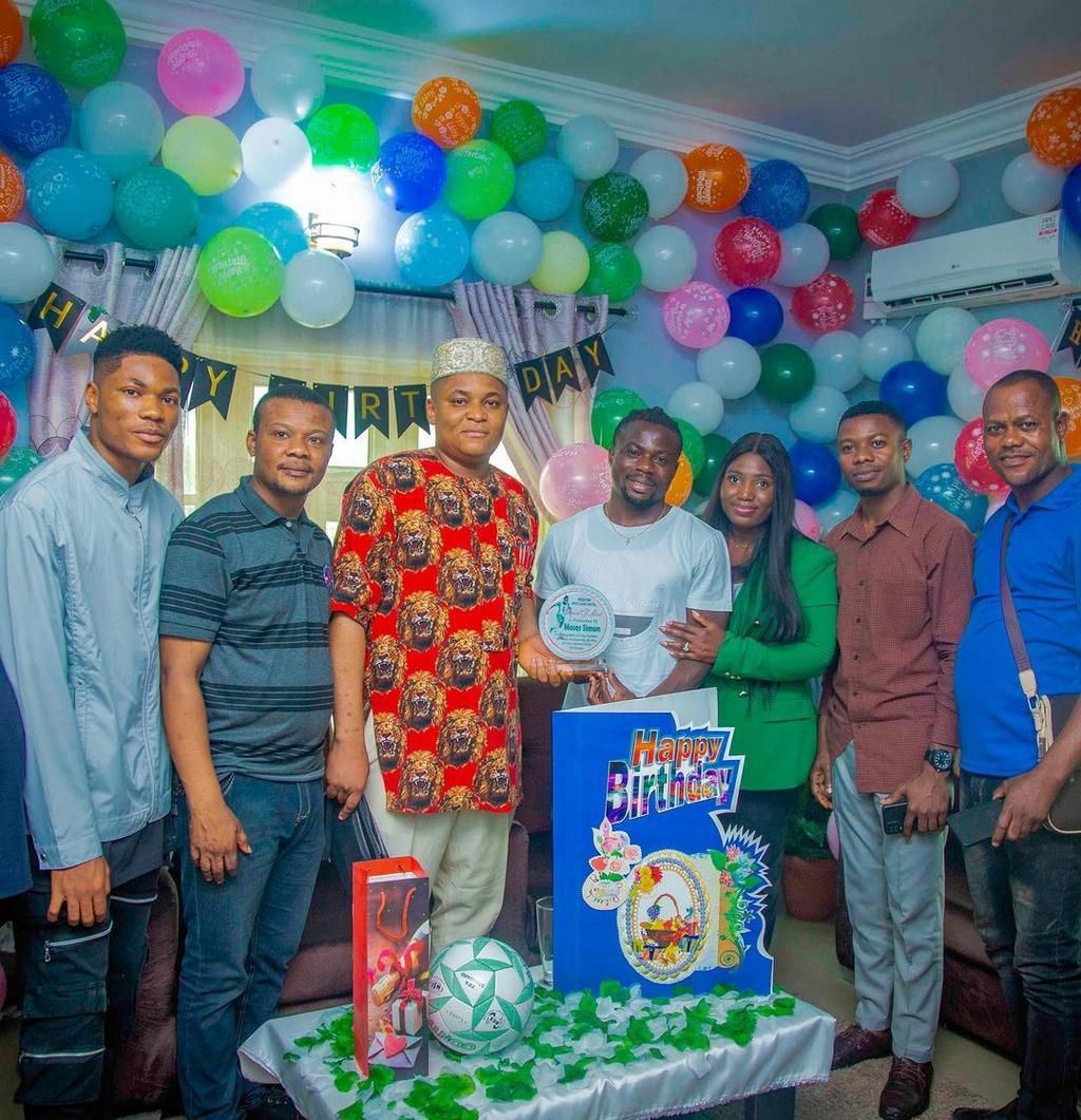 Moses Simon celebrates 27th birthday with cake and wine