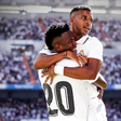 Vinicius and Rodrygo embrace.