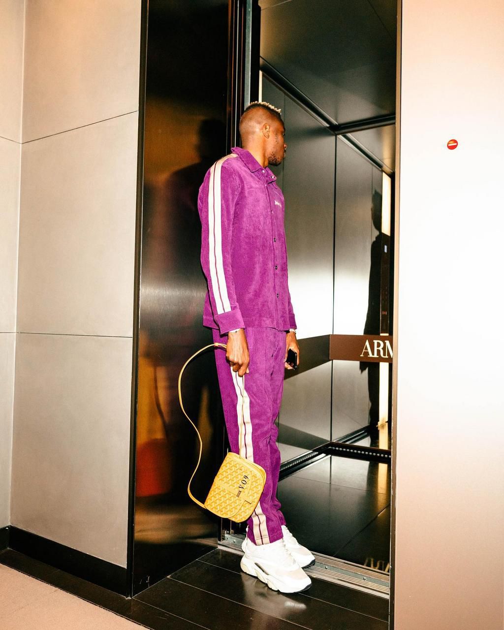 Victor Osimhen rocks purple outfit on social media