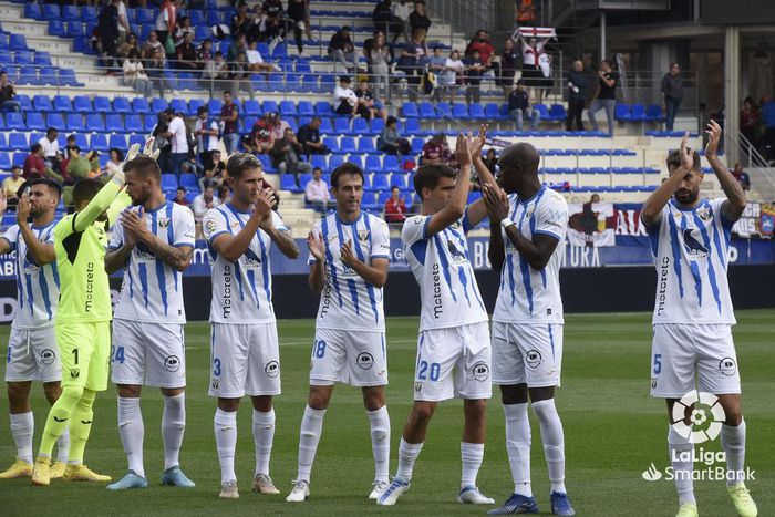 Leganes players applaud their fans after the game.
