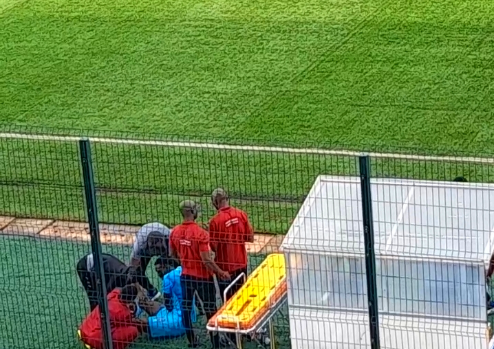 Isah Ali treated by the medics after he was stretched off vs AS FAR.