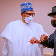President Muhammadu Buhari (left) with former President Goodluck Jonathan (right) [Presidency]