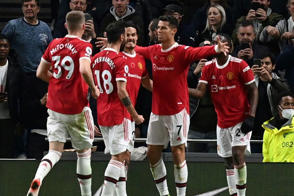 Cristiano Ronaldo (2nd right) celebrates his goal for Manchester United against Tottenham