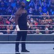 Omos (L)towers above Bobby Lashley (R)