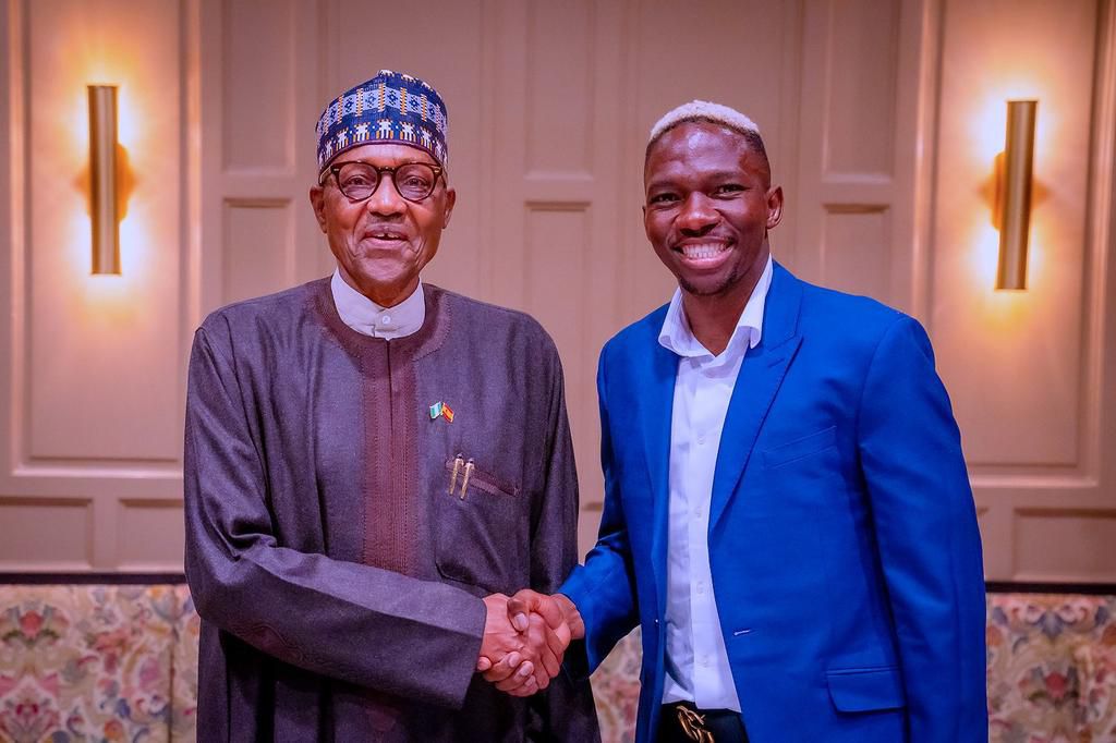President Buhari meets Omeruo In Spain