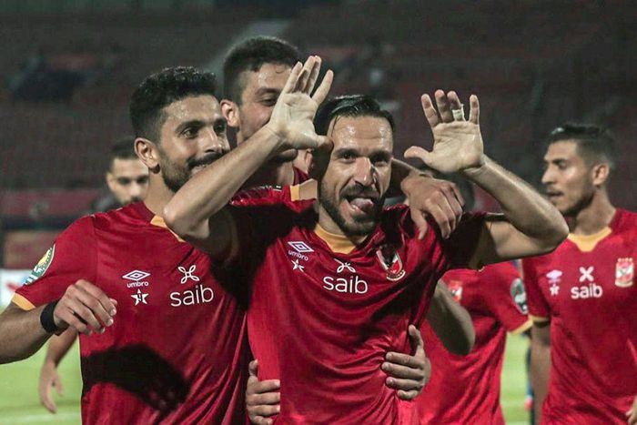 Defender Ali Maaloul (C) and teammates from Egyptian club Al Ahly celebrate a goal en route to winning the 2021 CAF Champions League