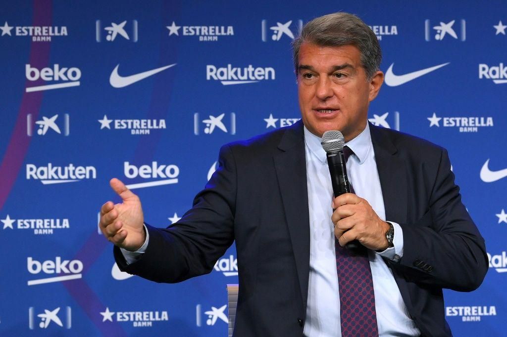 Joan Laporta said Barcelona were working to persuade Lionel Messi to stay as the club introduced Eric Garcia