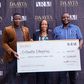 DAAYTA 2022 Winner Tunde Adeyemi, CEO of D-Olivette Enterprise, (left), receiving the prize from Ms. Jumoke Ogundare CEO of ARM, (middle), with Idris Salami, Co-Founder, D-Olivette Enterprise, (Right), at the Prize Award ceremony.