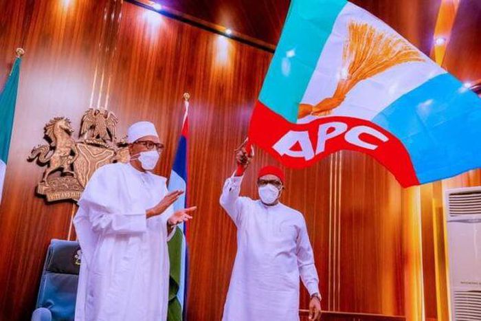 President Muhammadu Buhari after handing the APC flag to Senator Andy Uba. [Presidency]