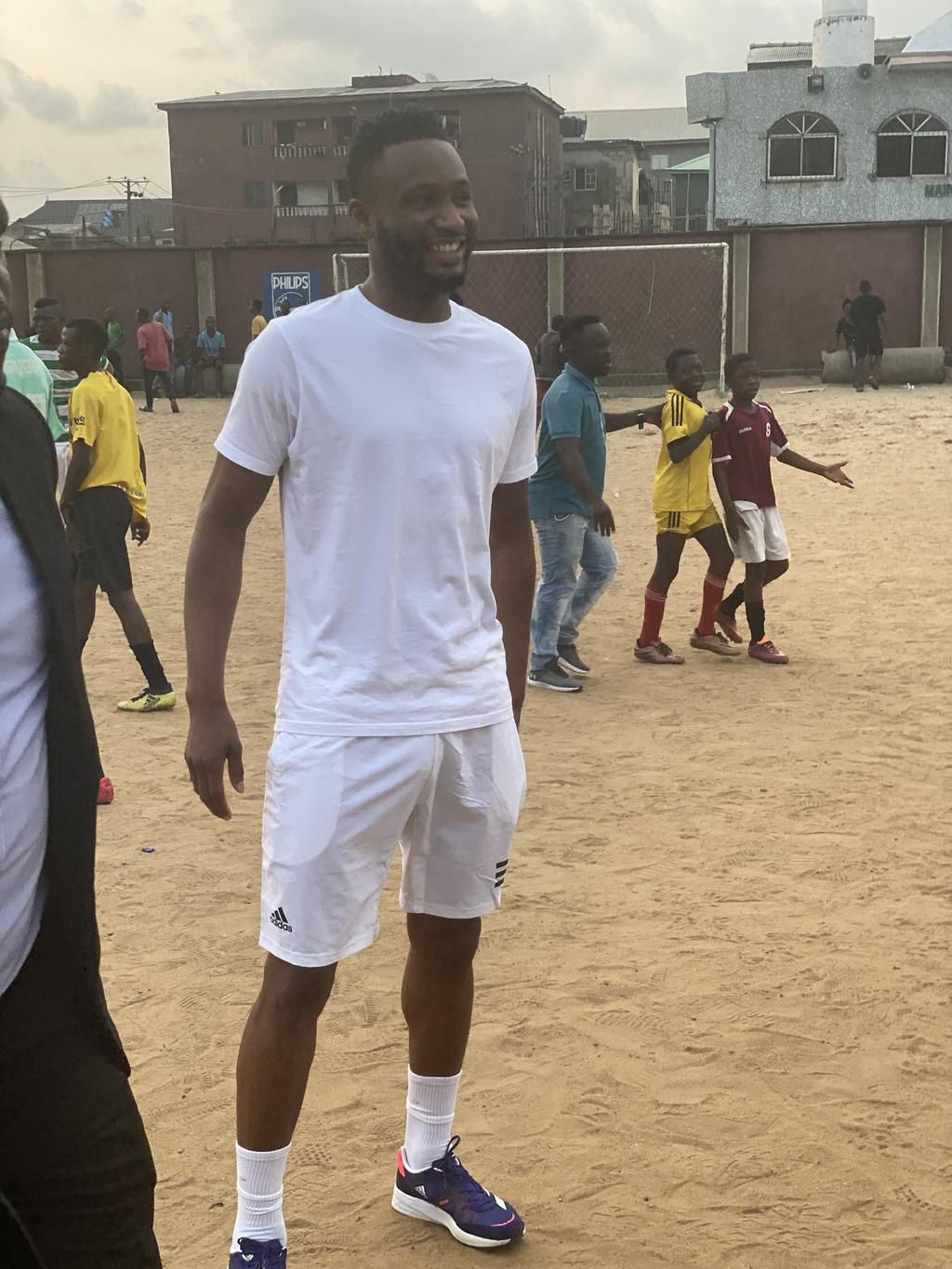 Mikel Obi plays with kids at Ebute Metta